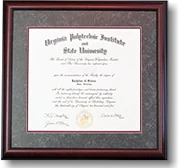 A Virginia Tech diploma matted in a gray stone-textured mat with a maroon inner line.